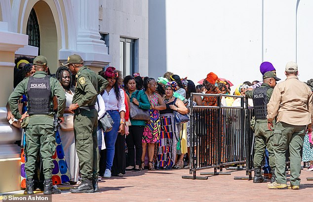 People were queuing outside the venue in Cali where Meghan gave a speech about female empowerment