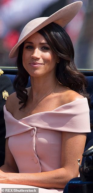 The look appeared to be a source of inspiration for Meghan's Trooping the Colour ensemble in 2018, where she chose a Carolina Herrera dress with a similar neckline and hue