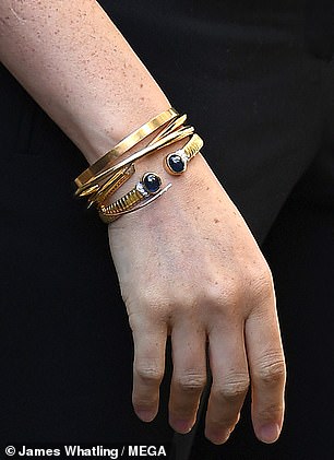 Meghan has worn Diana's cuff at numerous events, including the launch of her clothing collection with the charity Smart Works in 2019