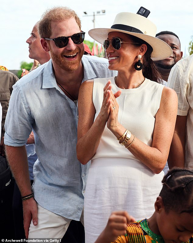 Pictured: Prince Harry and Meghan during their tour of Columbia this month