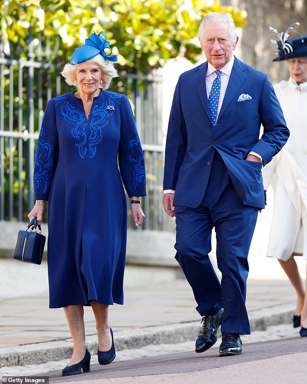 King Charles casually walks with one hand in his jacket pocket as he arrives at the Easter Sunday Mattins Service at St George's Chapel, Windsor, in 2023