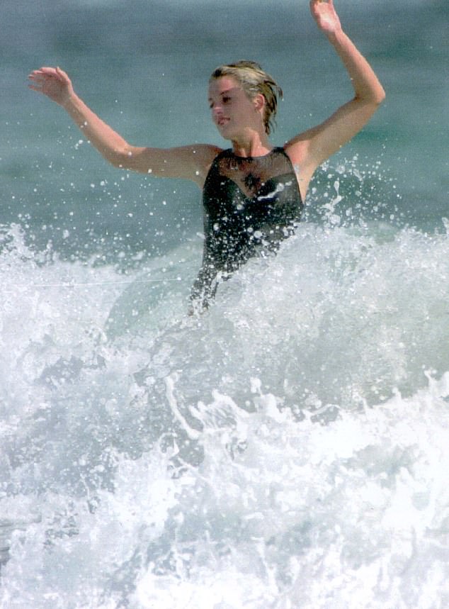 Princess Diana pictured in the sea during a holiday in Nevis in 1993