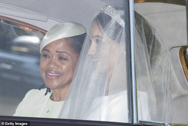 Doria and Meghan making their way by car to St George's Chapel in May 2018