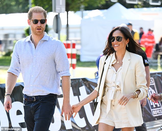 Harry and Meghan attend the cycling medal ceremony at the Cycling Track during day six of the Invictus Games in Dusseldorf, Germany, in 2023