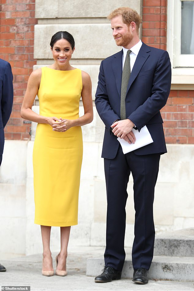 The Duke and Duchess of Sussex pictured in 2018 attending the Your Commonwealth Youth Challenge reception at Marlborough House, London in 2018