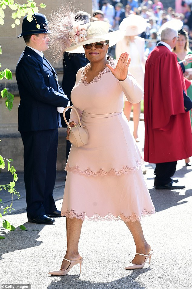 Oprah Winfrey was a guest at the 2018 wedding of Meghan and Prince Harry. She is pictured arriving at St George's Chapel at Windsor Castle before the nuptials