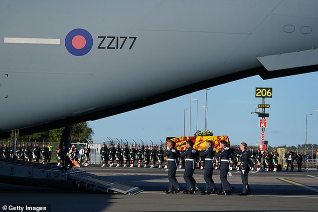 The Queen's coffin being carried into a RAF C17 aircraft at Edinburgh airport before beginning the journey to London, September 13, 2022