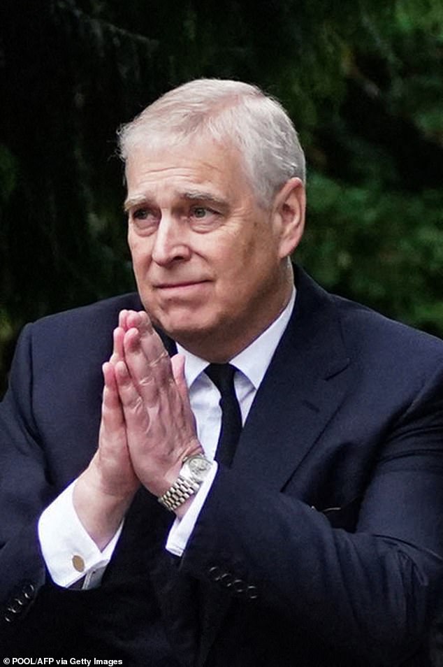 Prince Andrew greets members of the public who have gathered outside Balmoral to pay their respects to the Queen, September 10, 2022