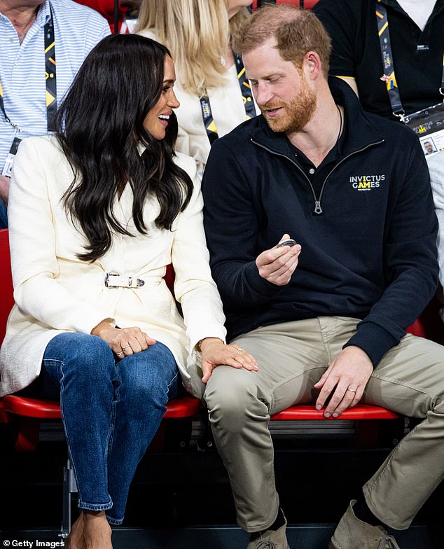 Harry and Meghan attend the volleyball on day two of the Invictus Games in April 2022