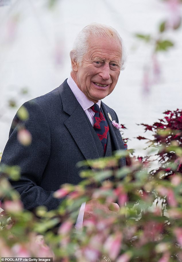 King Charles III smiles during a visit to the Royal Horticultural Society of Aberdeen's 200th Flower Show on August 31 this year