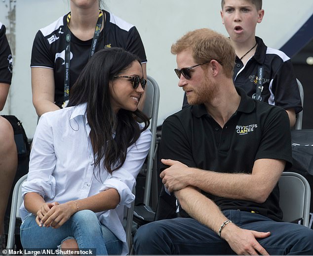 Prince Harry and his then-girlfriend and now-wife Meghan are seen here attending the wheelchair tennis at the Invictus Games in 2017, also in Canada but in Toronto