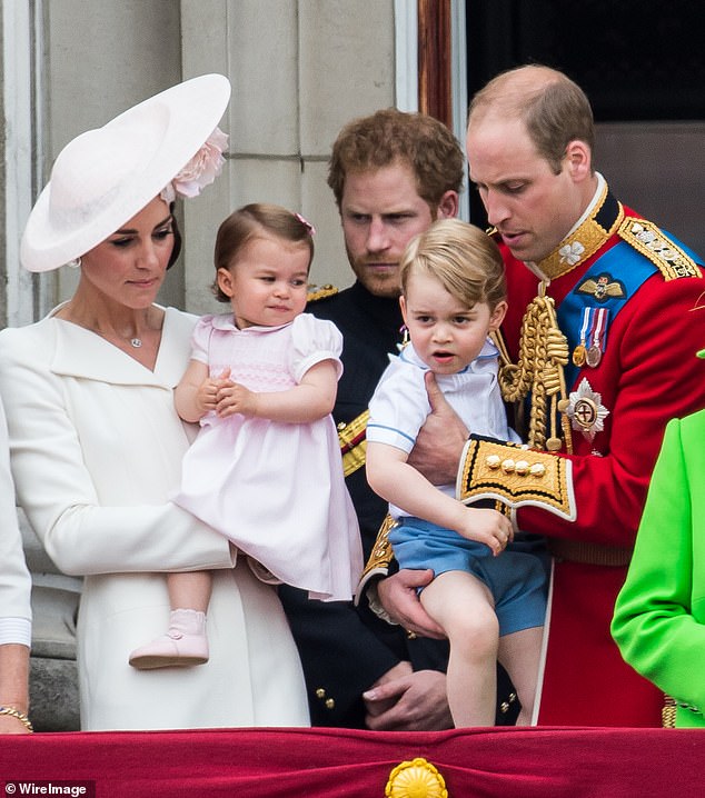 Kate (far left) Princess Charlotte, (left) Prince George, (right)  Prince Harry, (centre) Prince William (far right) stand on the balcony during the Trooping the Colour in 2016