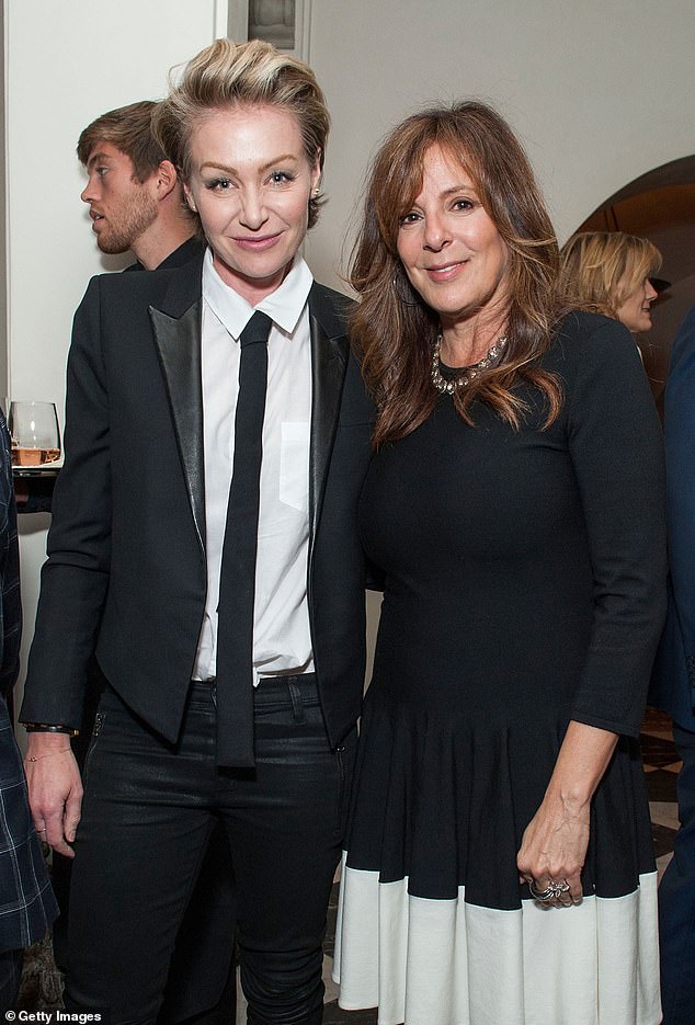 Jackson with Portia de Rossi in 2014, who is married to Ellen DeGeneres and also part of the Sussex Squad