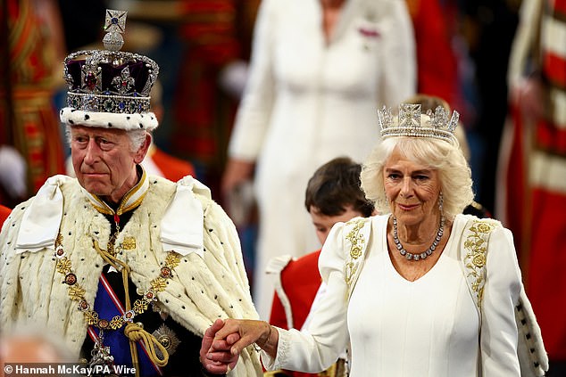 King Charles III and Queen Camilla, wearing the George IV State Diadem, during the State Opening of Parliament on July 17