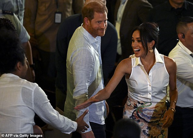 She wore her hair swept back in a glamorous updo to and kept her make-up natural