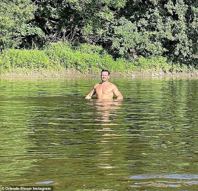 Letting loose: Orlando Bloom, 44, stripped down to the nude for an invigorating swim in nature in 2021