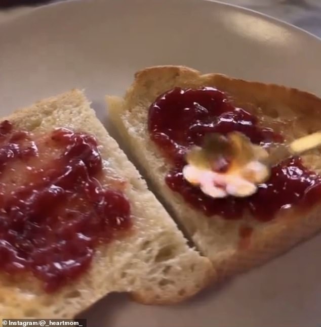 In the clip, captioned 'mornings with American Riviera Orchard', Kelly spoons the jam and spreads it thickly on a slice of white toasted bread - with a gold spoon shaped like a flower