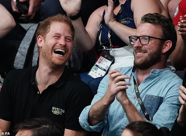 The Duke of Sussex (left) and JJ at the wheelchair basketball competition during the Invictus Games at the Merkur Spiel-Arena in Dusseldorf