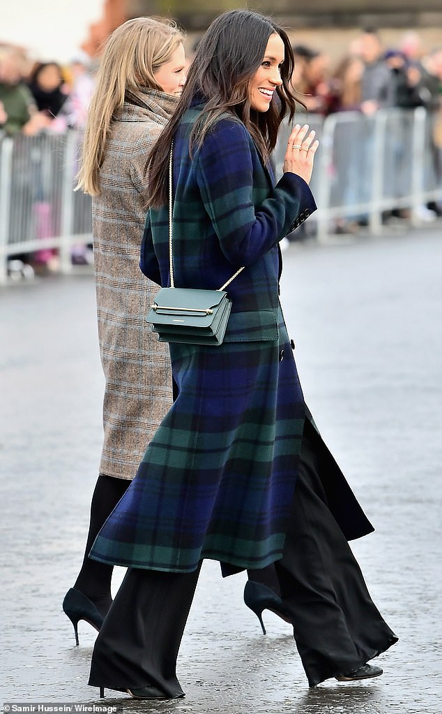 Meghan Markle wore floor-length trousers to visit Edinburgh Castle during her first official joint visit to Scotland with Prince Harry in February 2018