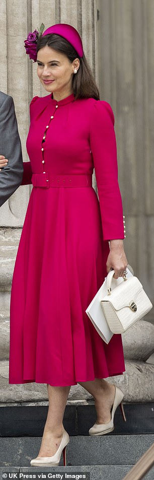 ophie Winkleman, wife to Lord Fredrick Windsor, wore the same dress in bright fuchsia to the service