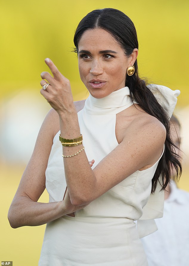 The Duchess of Sussex, watches the prize ceremony at the 2024 Royal Salute Polo Challenge on April 12