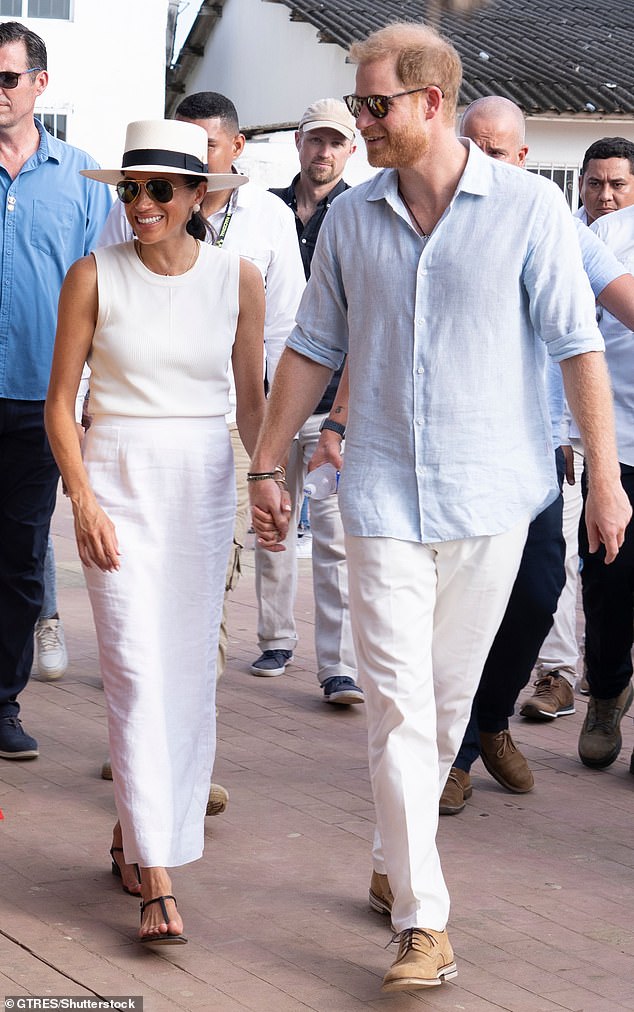 Prince Harry and Meghan Markle pictured during their quasi-royal tour of Columbia in August