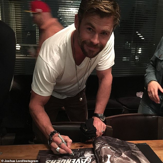 Pictured: Avengers star Chris Hemsworth in Lord's Lower East Side tattoo parlor in 2018