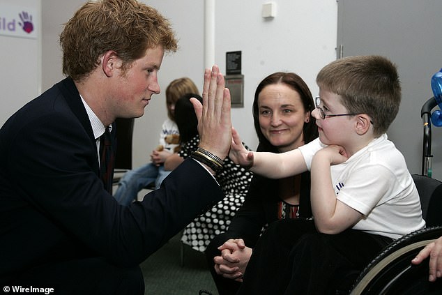 The Duke of Sussex is seen here with Christopher Anderson, who nominated Caroline Anderson for Best Nurse, during the WellChild Childrens' Health Awards ceremony at Lord's Cricket Ground in north-west London in October 2007