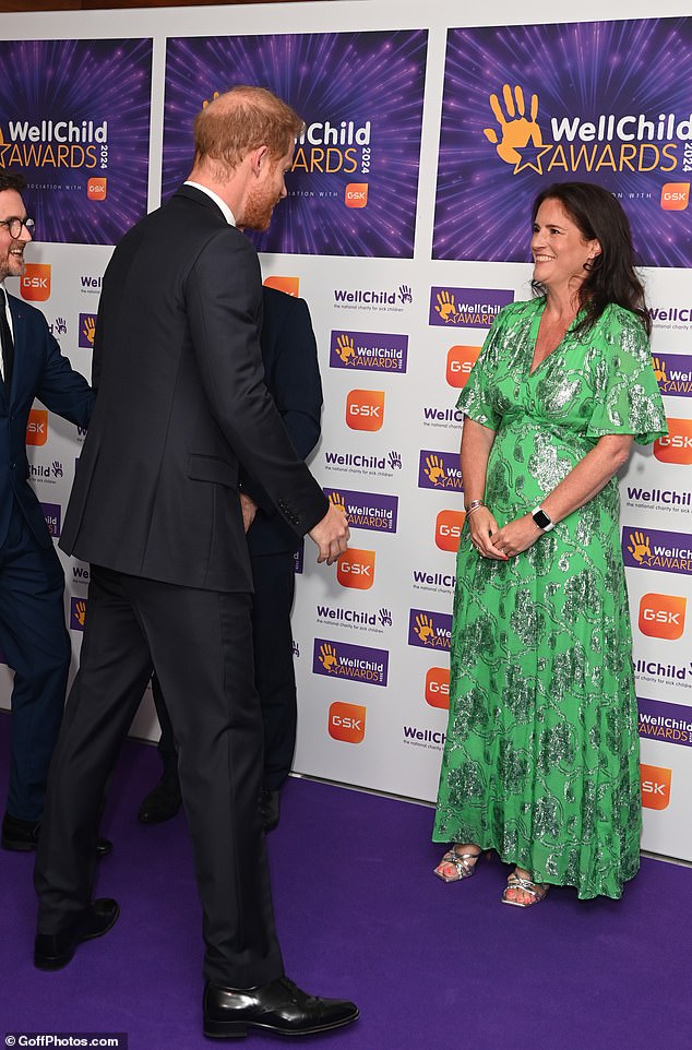 Harry was greeted on the purple carpet at the event, which is close to his heart