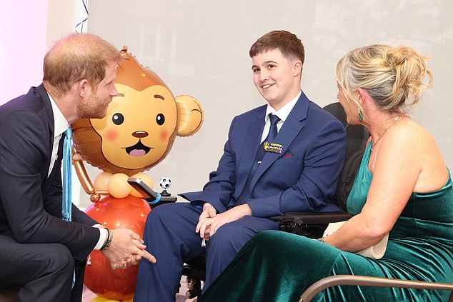 George Shippey, aged 16, meets Prince Harry as the Duke of Sussex attends the WellChild Awards