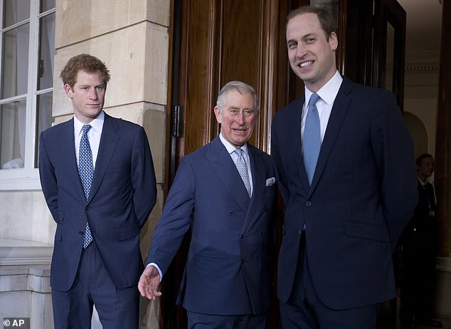 There have been questions over whether Prince Harry (left) would catch up with his father King Charles (centre) or brother Prince William (right) while in the UK - they are seen here together outside Lancaster House in central London in February 2014