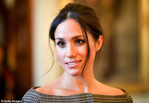 Pictured: Meghan Markle chats with people inside the Drawing Room during a visit to Cardiff Castle in January