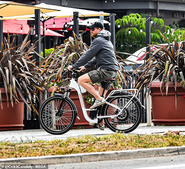 Prince Harry loves a solo bike ride in his spare time - but followed by his security team, neighbours have said