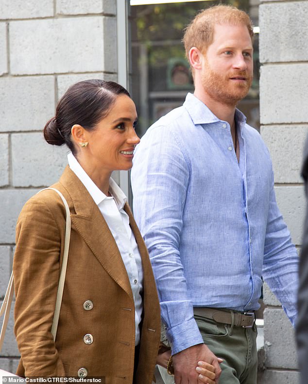 Meghan Markle showed off her effortlessly chic style as she and Prince Harry visited a school in the Santa Fe area of Bogota on Friday