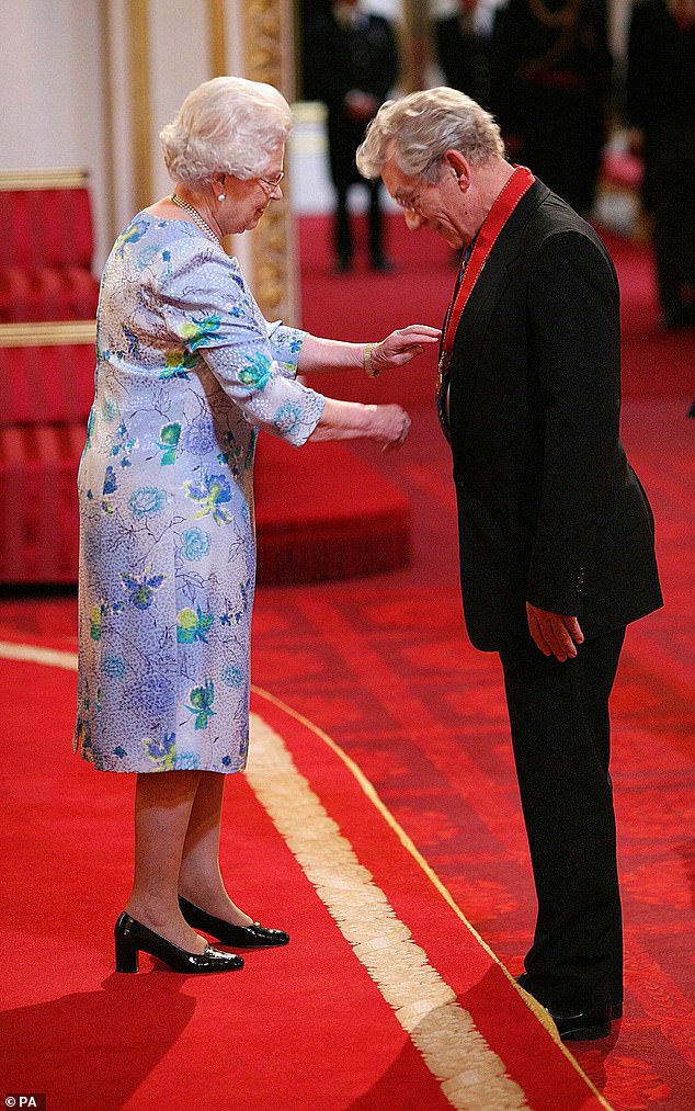 Actor Sir Ian McKellen receives a Companion of Honour medal for services to drama and equality, from Queen Elizabeth II in 2008