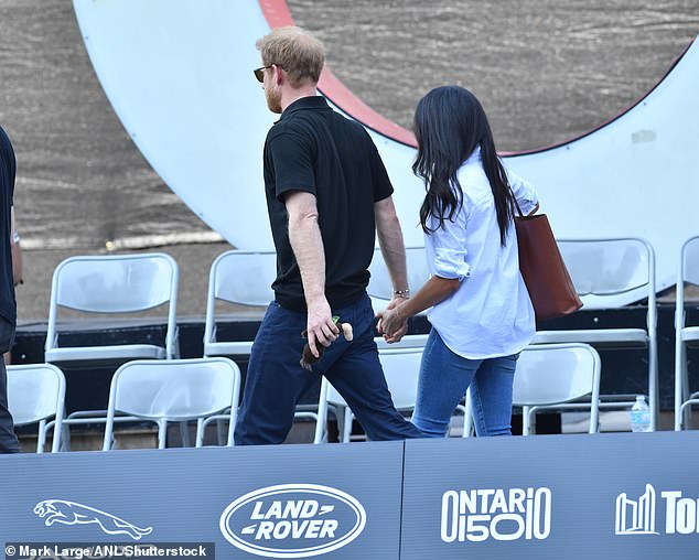 Acting very affectionate towards each other, the couple are seen holding hands