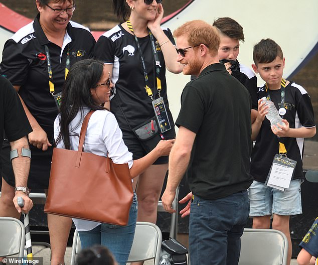 The couple enjoy a laugh as they chat during their outing in Toronto