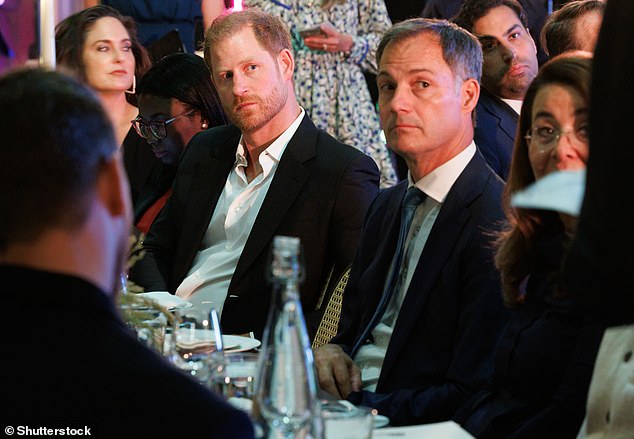 At the weekend Prince Harry followed in his mother's footsteps by arriving in the city without his wife Meghan Markle for a series of engagements. Above: The Duke of Sussex seated alongside outgoing Belgian prime minister Alexander De Croo at a dinner organised by the World Health Organisation in New York on Sunday