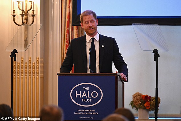 Harry was greeted by a rapturous round of applause as he took to the stage to deliver an eight minute speech in which spoke of the charity's work in Angola meaning a 'great deal' to his late mother Princess Diana