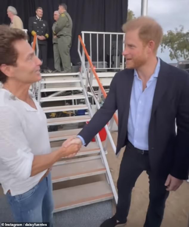 Pictured: Prince Harry shaking hands with Richard Marx, who performed at Kevin Costner's One805Live! concert yesterday