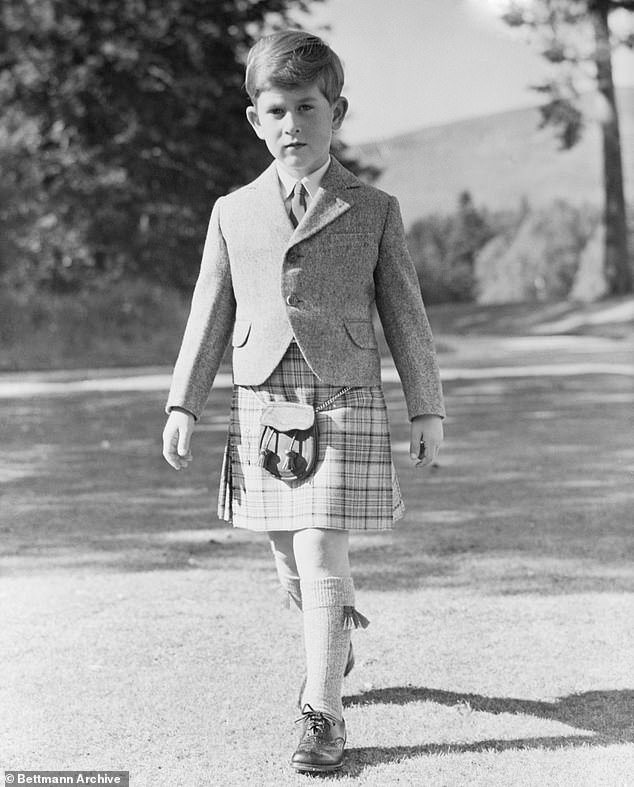 Prince Charles aged 7 wearing a tweed jacket with his Balmoral tartan kilt