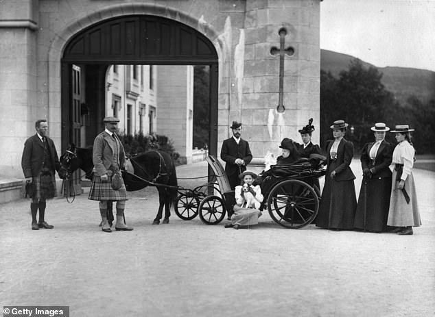 Queen Victoria at Balmoral in later life, with her family and servants