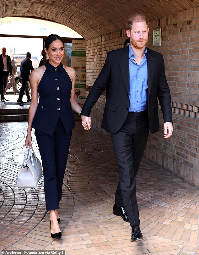 Harry's trip to Lesotho and South Africa appears to mark another week away from his wife Meghan. Pictured: The couple in Colombia in August