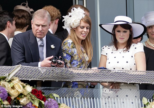 Prince Andrew with his daughters Beatrice and Eugenie watching the Epsom Derby in 2011