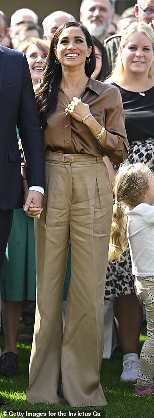 Meghan showcased wide-leg camel trousers by Gabriela Hearst in September 2023