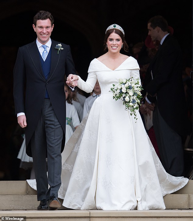 The bride and groom: Jack Brooksbank and Eugenie leaving the chapel after the wedding ceremony