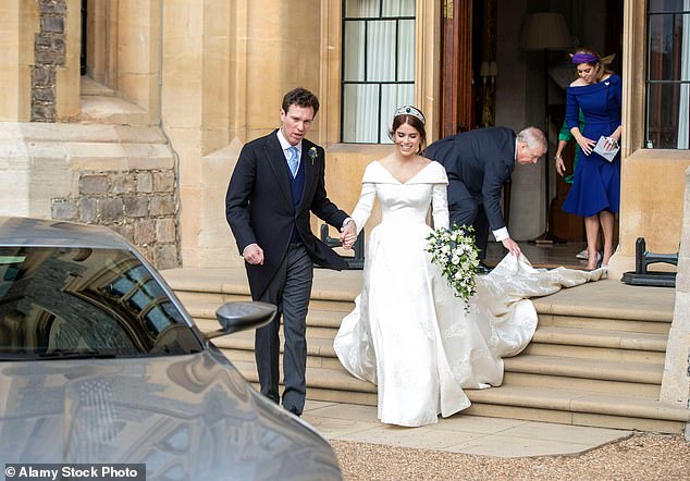 The bride and groom leaving Windsor Castle and heading to Royal Lodge for their evening reception