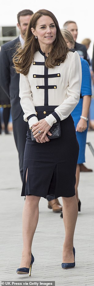 The other pencil skirt in the Princess's closet hails from Alexander McQueen. She is seen wearing it (above) during a visit to Portsmouth in 2016