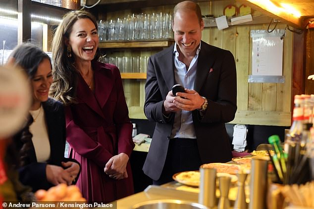 Princess Kate and Prince William enjoying their visit to an Indian restaurant in Birmingham last year