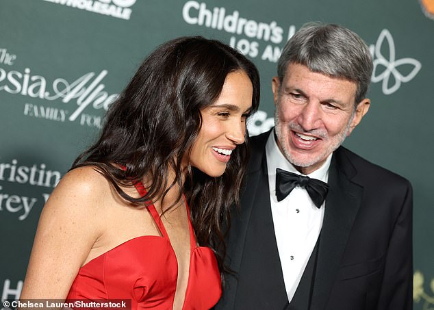 Meghan pictured smiling with Mr Viviano, CHLA President, at the children's gala on Saturday night